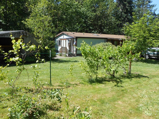 House across part of the meadow. . .